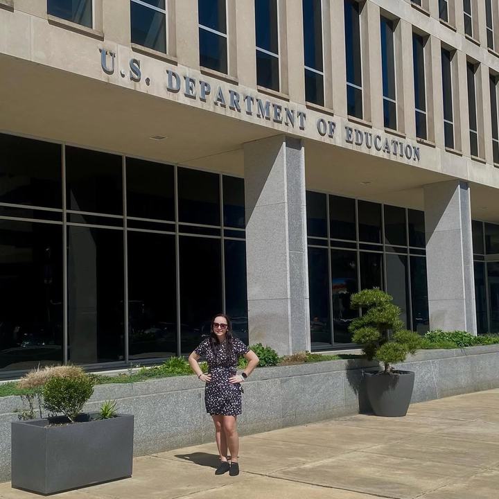 Juliette Gudknecht outside the U.S. Department of Education